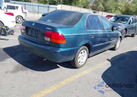 1997 Honda Civic Lx z USA, uszkodzony, nr VIN 1HGEJ6673VL024682